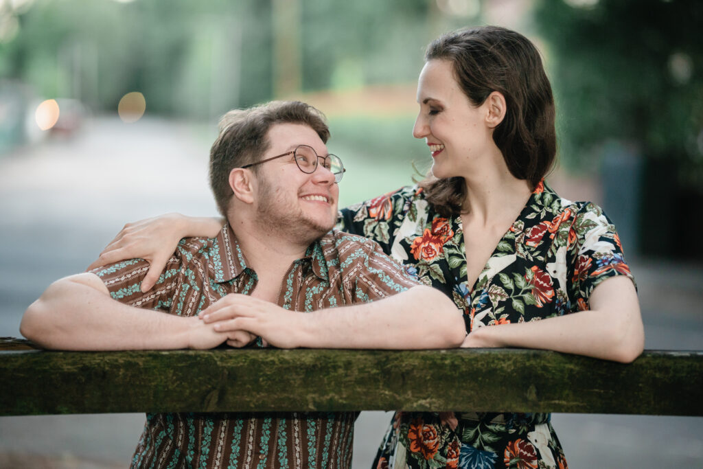 Fio and Georgia look at each other lovingly