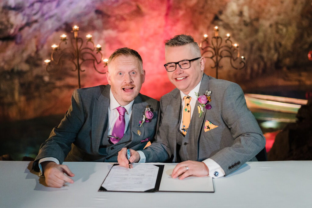 Andy and Dan sign the register at Wookey Hole caves