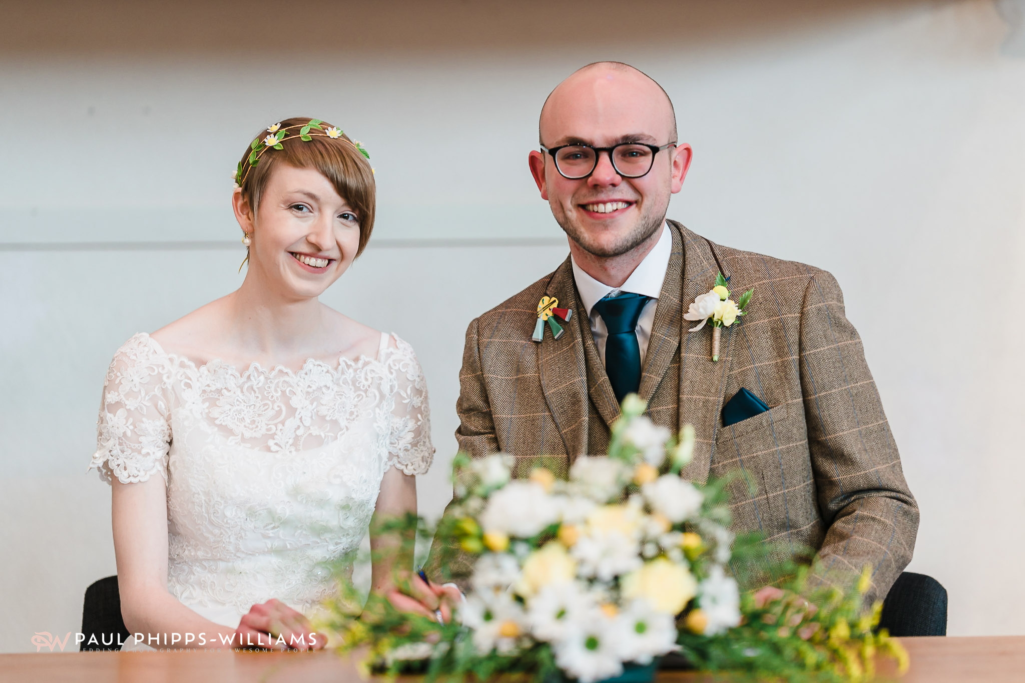 Emily and Sim sign the register