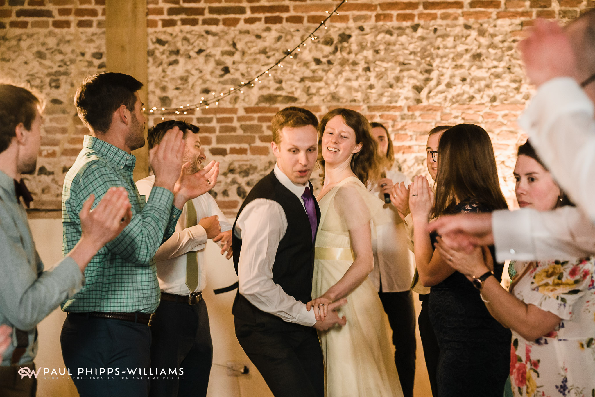 Couple dancing during ceilidh at Barford Park Barn