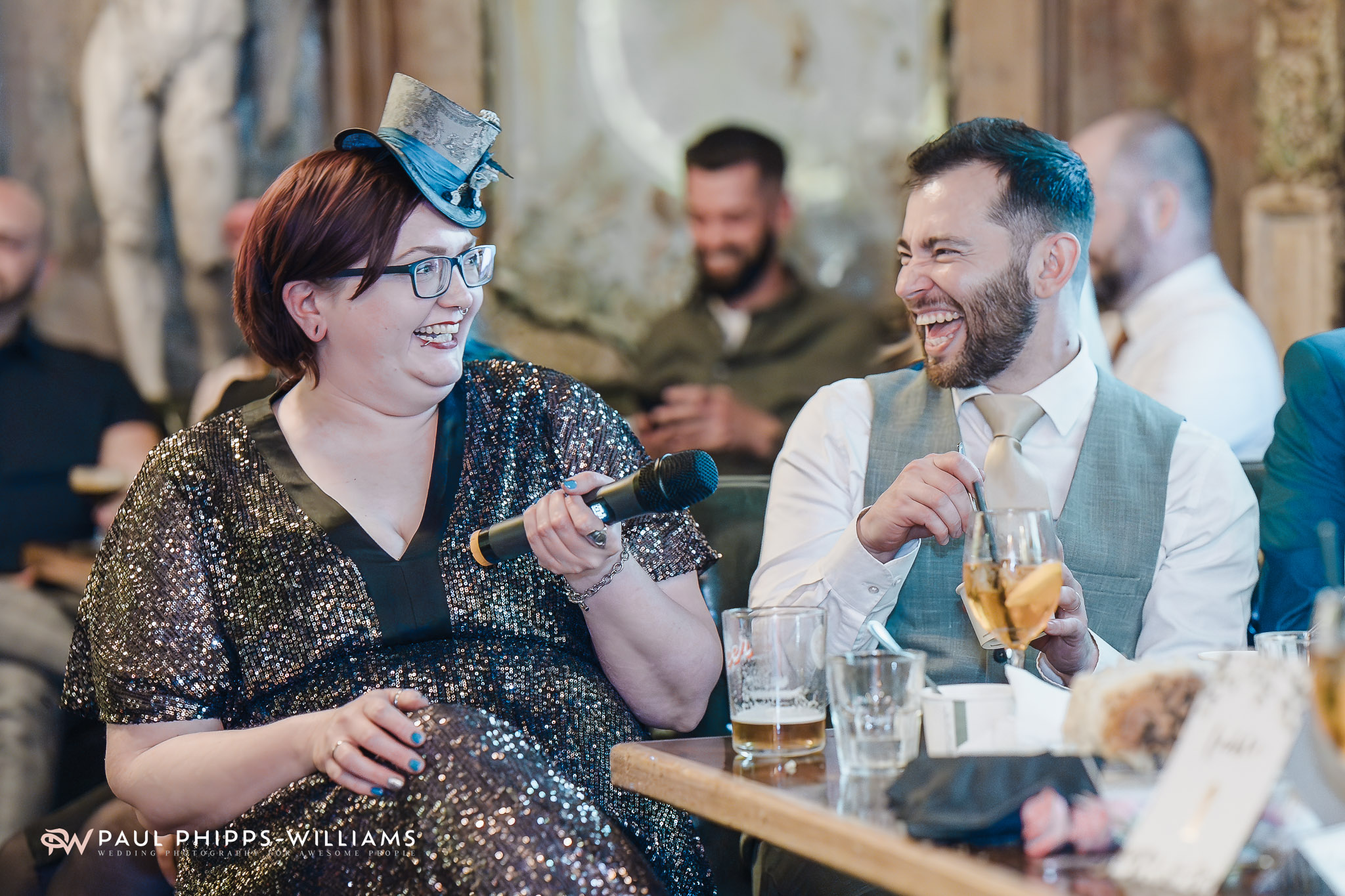 two people enjoy a wedding reception at the Old Queen's Head in London