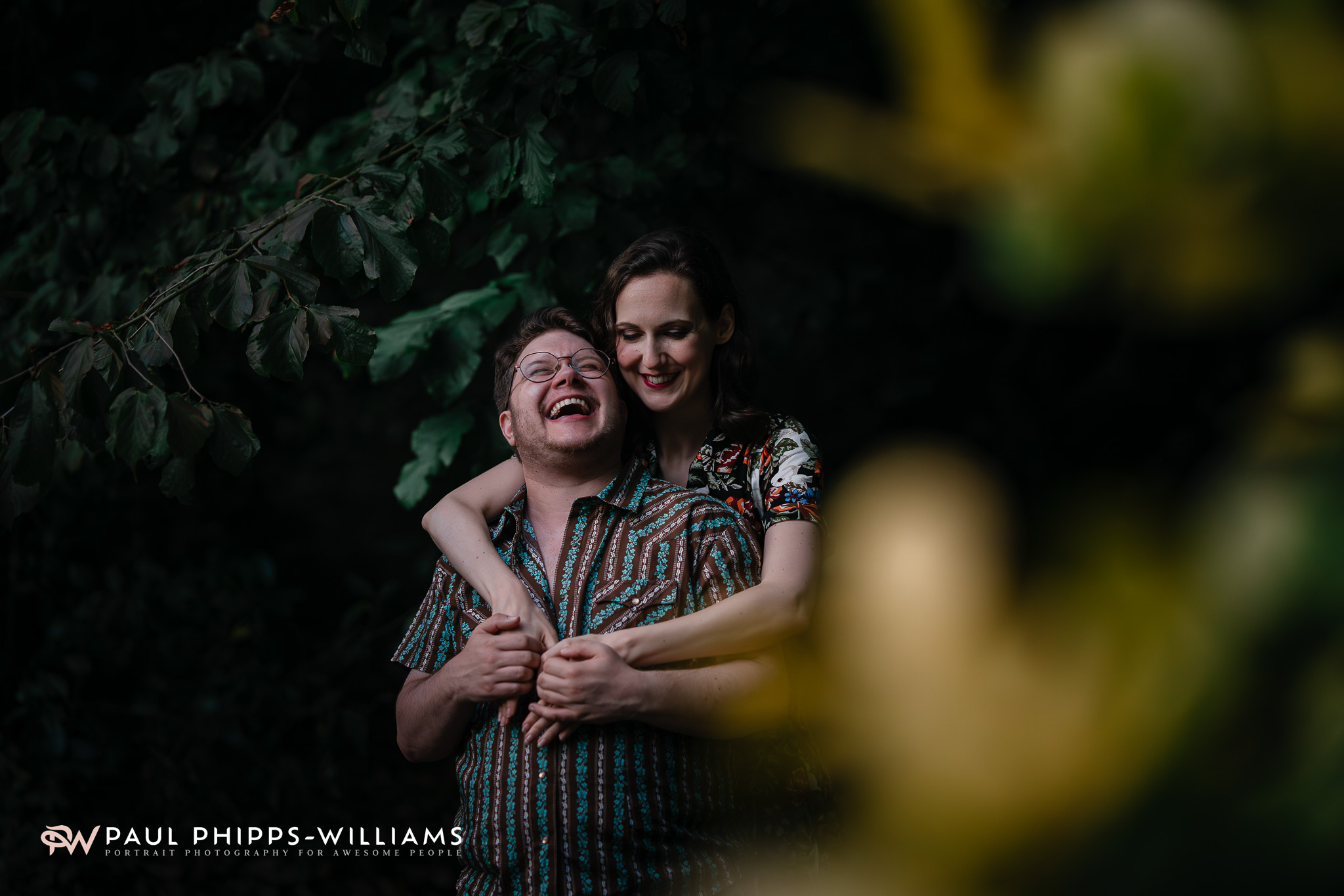 As evening approaches, Georgia embraces Fio, a trans man from Manchester, as he laughs