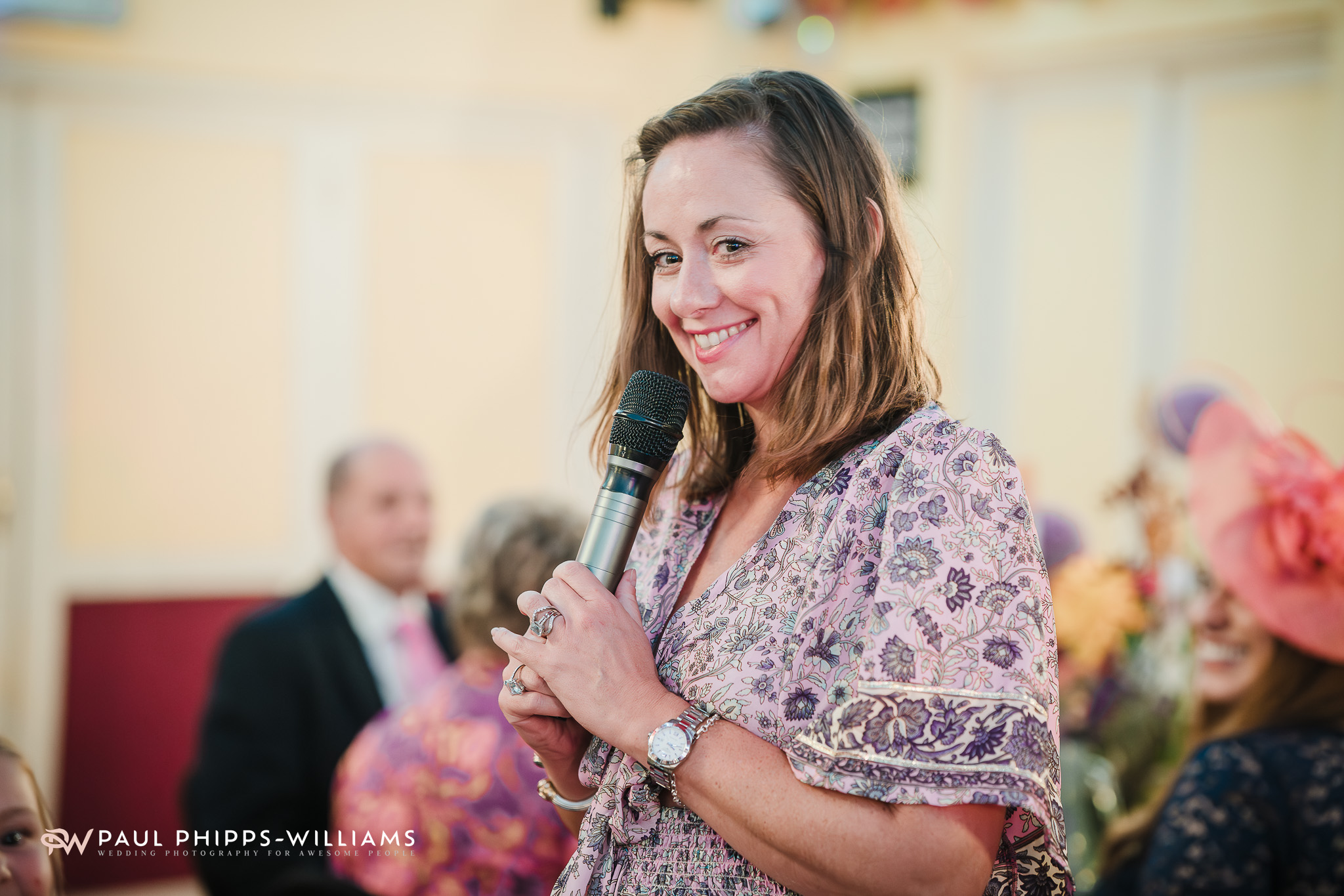 A woman smiles at the camera during a Wookey Hole wedding