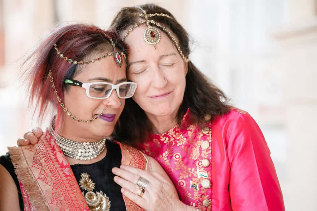 Two women in traditional attire at Hendon Town Hall
