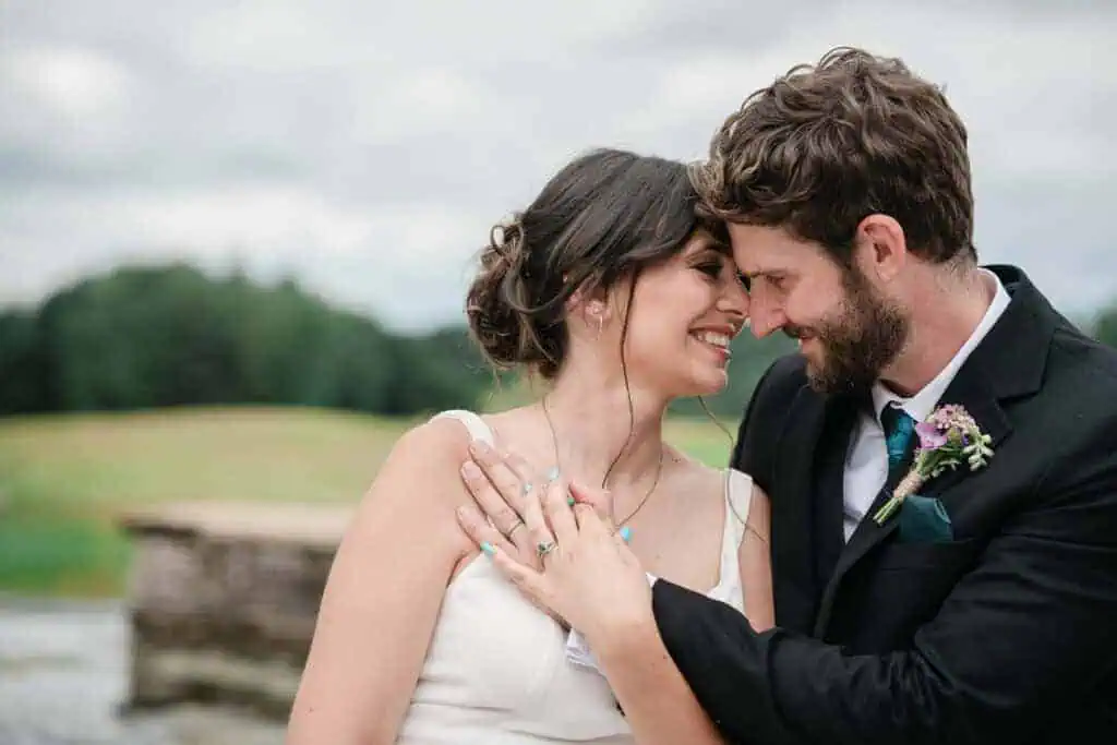 bride and groom laugh at a birmingham wedding