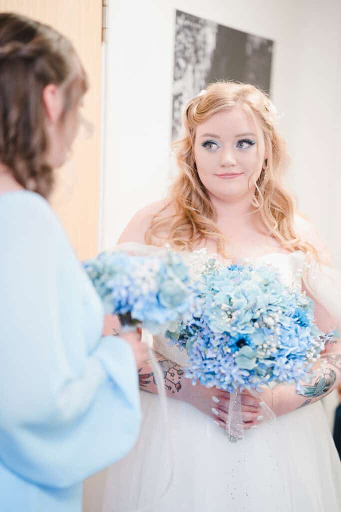 a birmingham bride gets ready to leave her hotel room